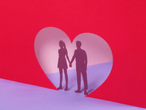 Silhouette of a couple holding hands inside a large red heart, symbolizing rekindled love and romance.